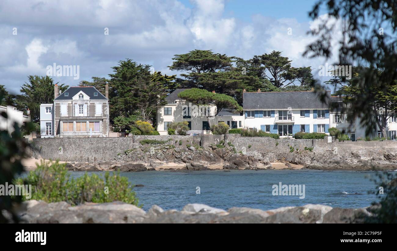 Wild coast and seaside houses in Brittany Stock Photo Alamy