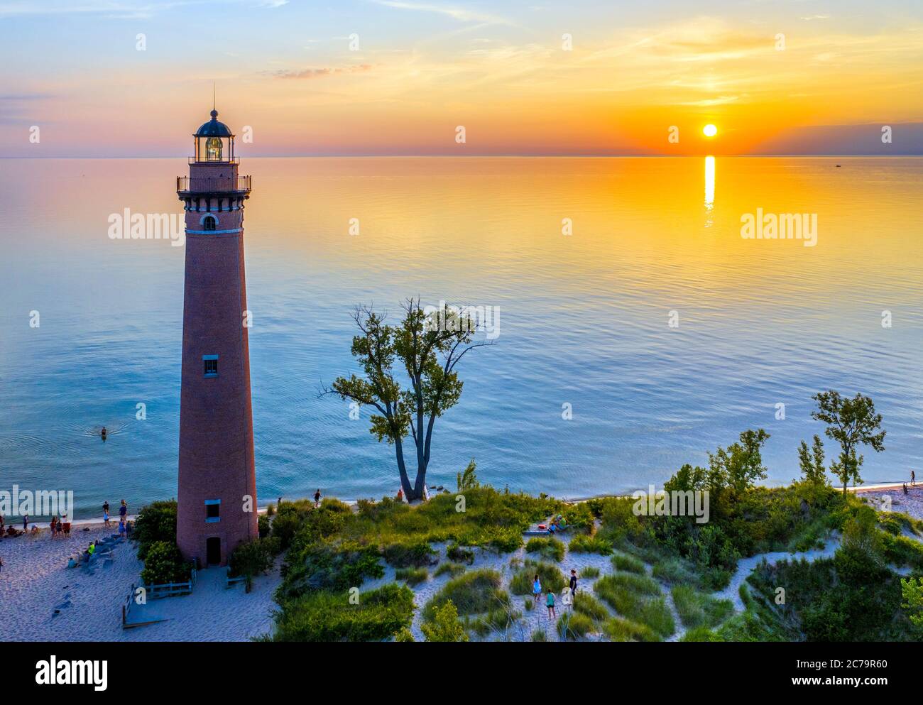 Aerial view of Little Sable Point Lighthouse at sunset over Lake Michigan; Mears, Michigan; Silver Lake State Park Stock Photo
