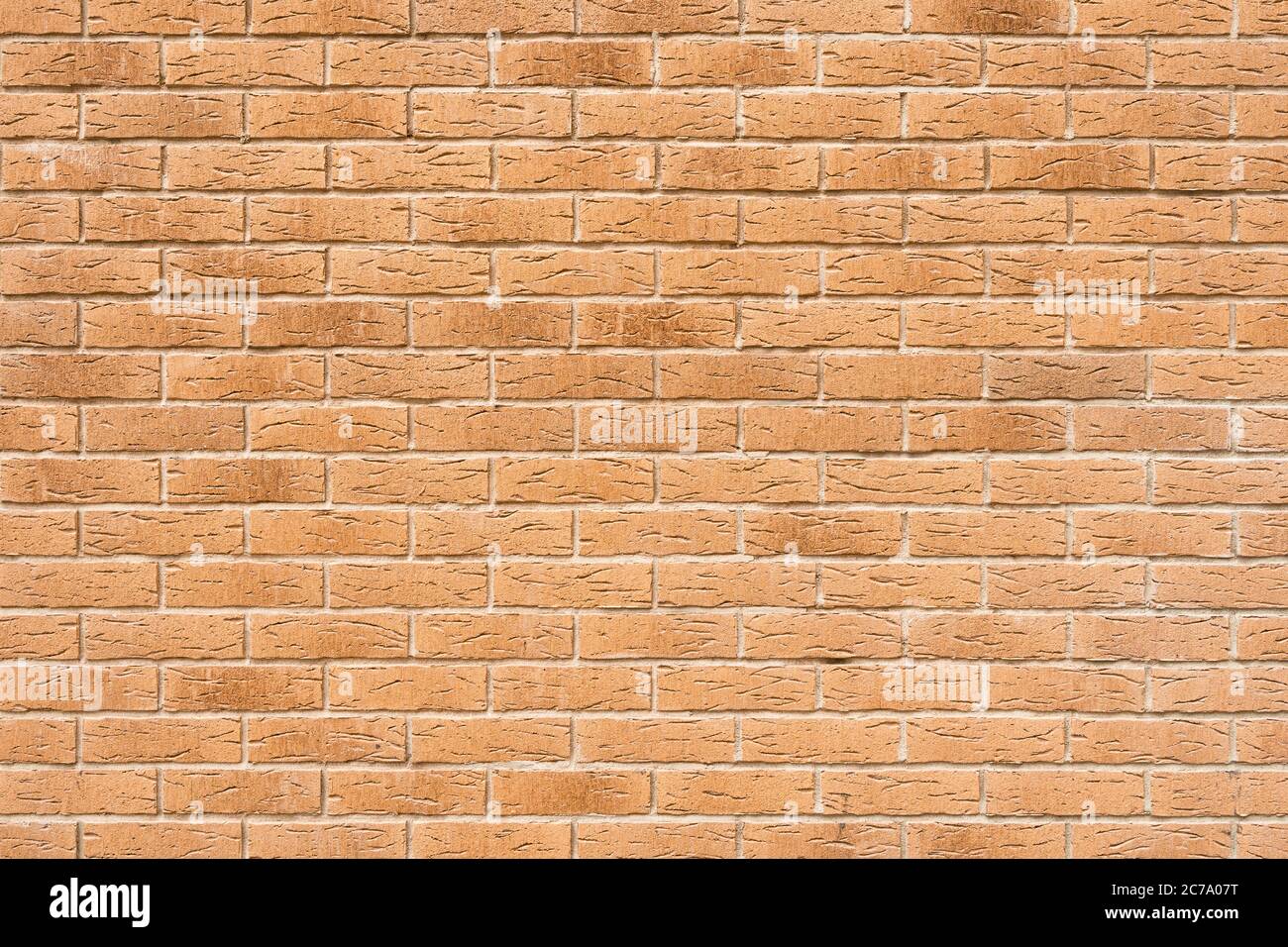Blank pink decorative grungy stonewall. Panoramic background of wide old red brick wall texture Stock Photo