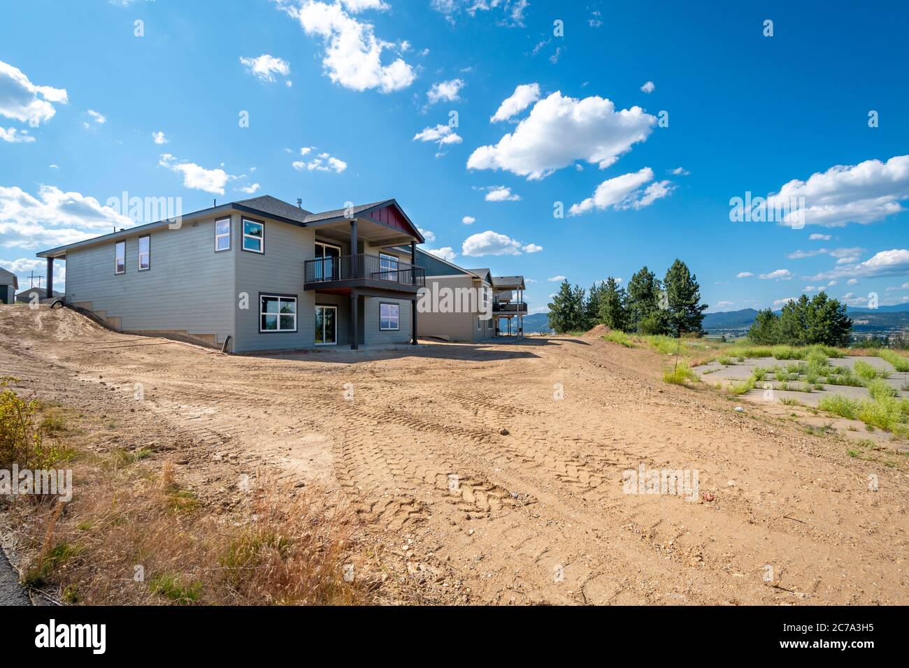 New upscale hillside homes under construction in an American