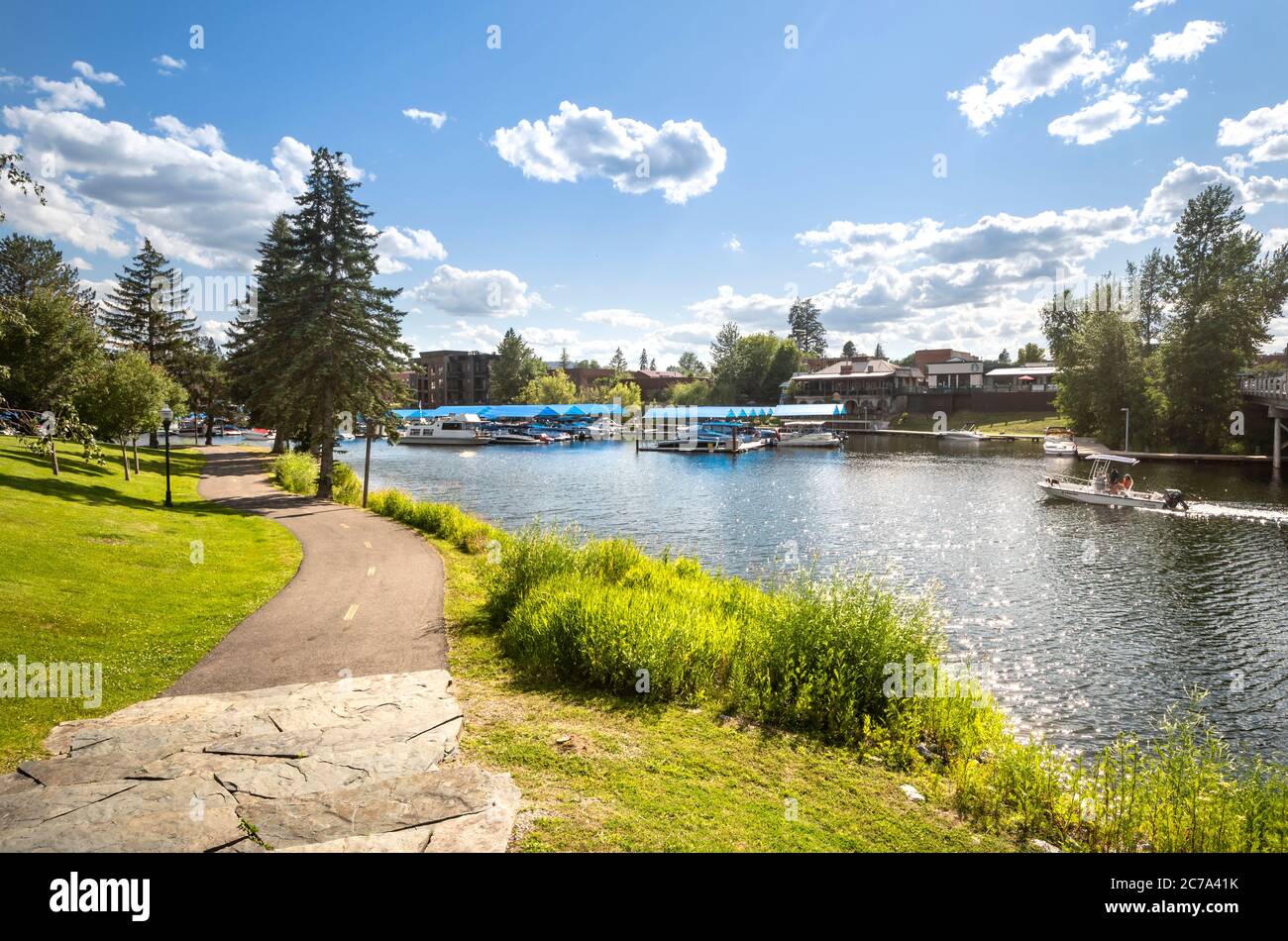 Boats dock along Sand Creek river along Lake Pend Oreille in the