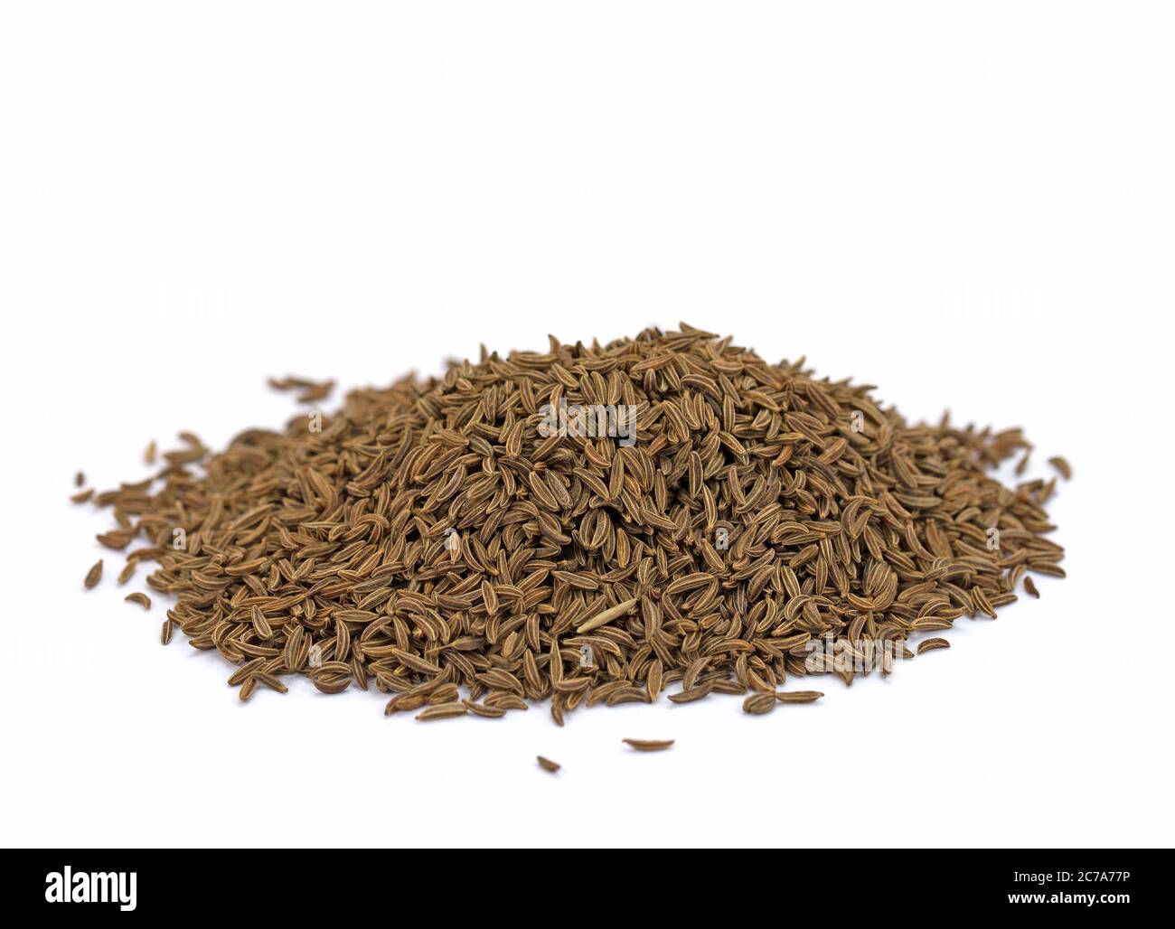 Caraway seeds isolated against a white background Stock Photo