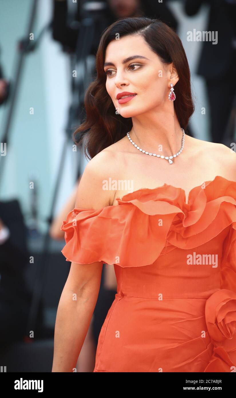 VENICE, ITALY - SEPTEMBER 07: Catrinel Marlon walk the red carpet ahead