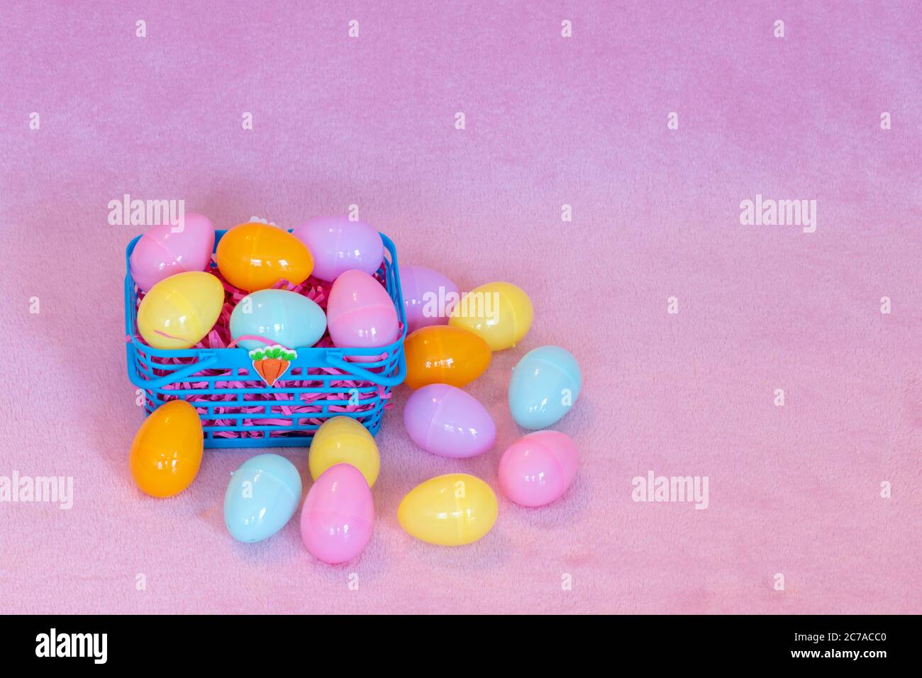 Festive Easter decorations and pink background. Stock Photo