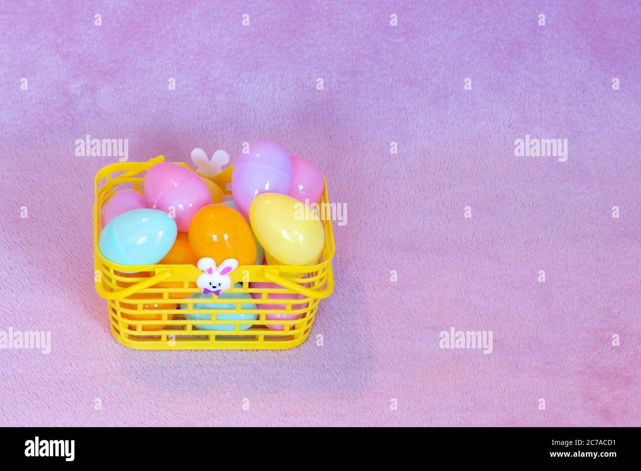 Festive Easter decorations and pink background. Stock Photo