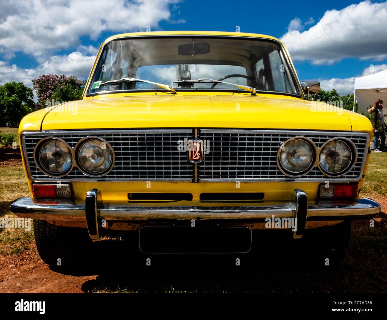 Front of yellow Soviet Lada passenger car displayed during annual Lilac festival in Dobele. Stock Photo