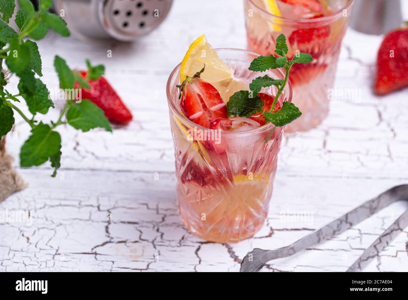 Summer strawberry lemonade with lemon Stock Photo