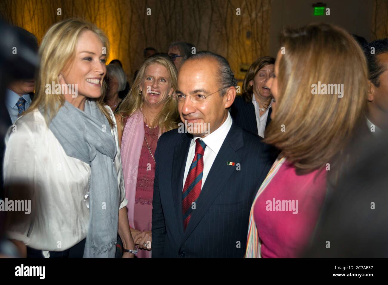 President Felipe Calderon of Mexico and wife Margarita Zavala attending the premiere party for Mexico The Royal Tour in downtown Los Angeles with Sharon Stone Stock Photo