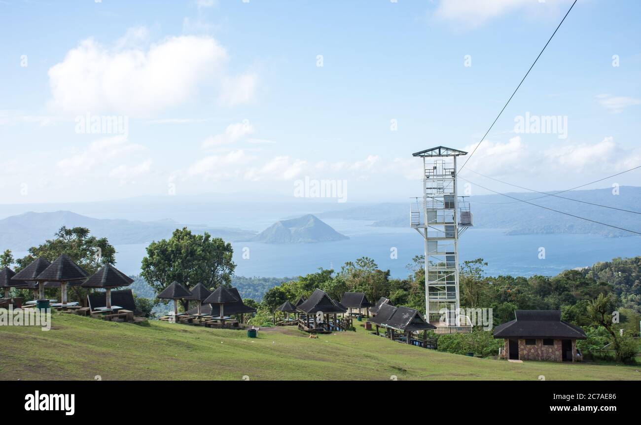 Tagaytay, Philippines - January 12, 2017: View of Taal Lake and Taal Volcano As Well As A Zipline Stock Photo