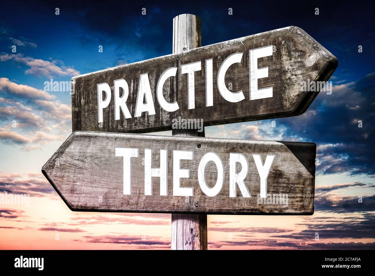 Theory, practice wooden signpost, roadsign with two arrows Stock