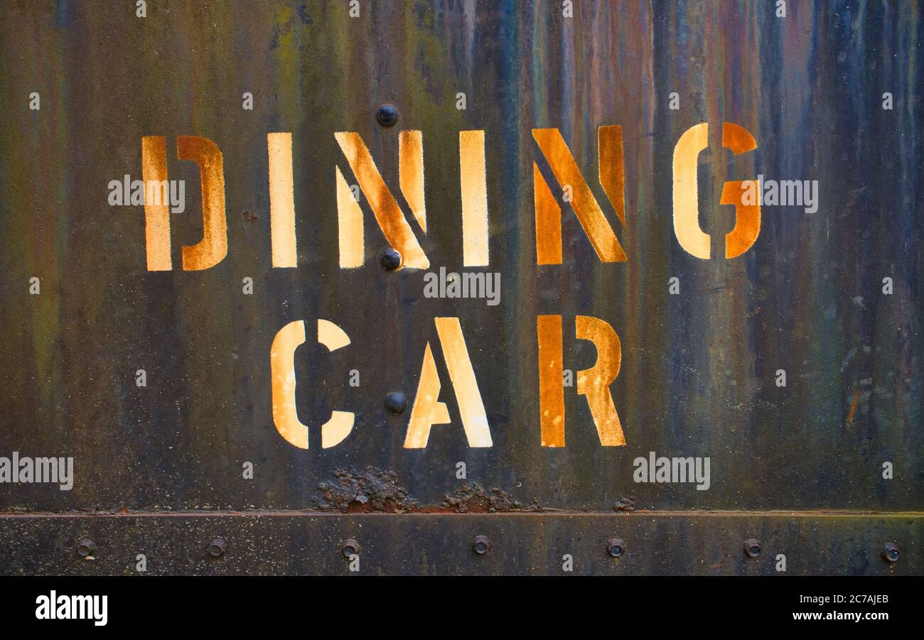 Painted sign on the side of a railroad dining car Stock Photo - Alamy