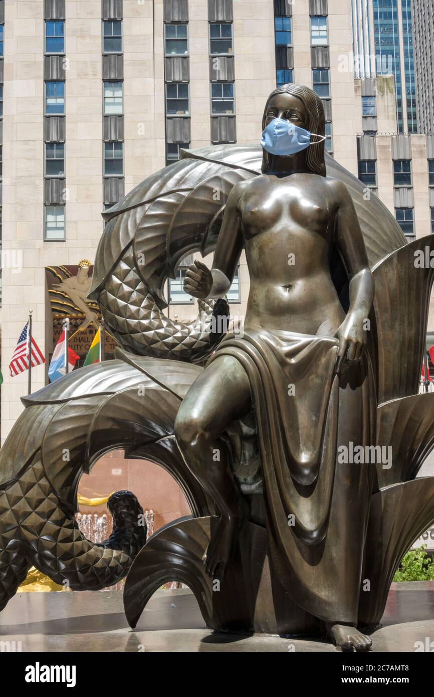 Mankind figure (Maiden and Youth), with Face Mask Rockefeller Center, New York City Stock Photo