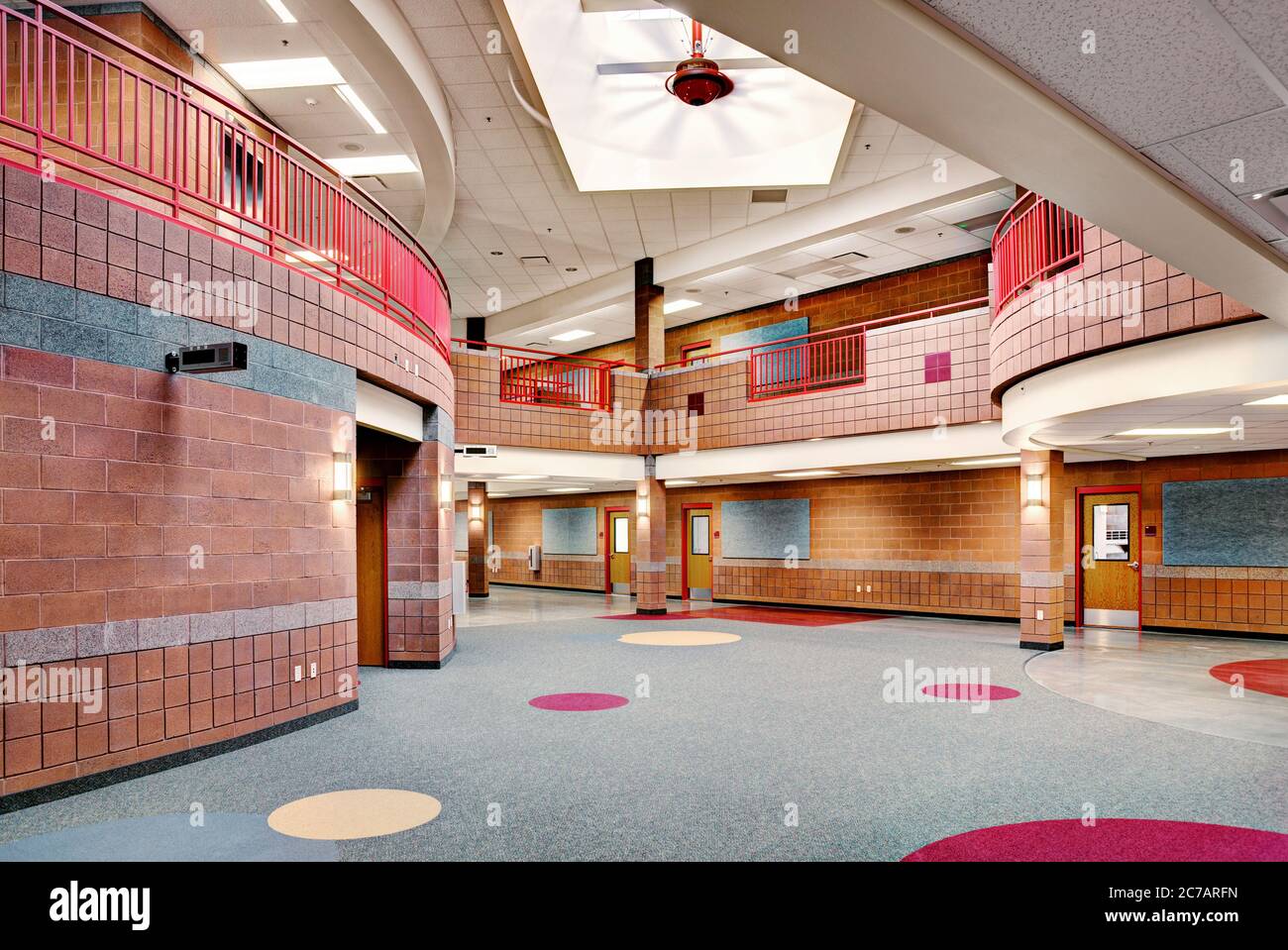 The main hallway in an elementary school, with money saving cnstruction materials, and High efficency computer controlled LED light fixtures. Stock Photo