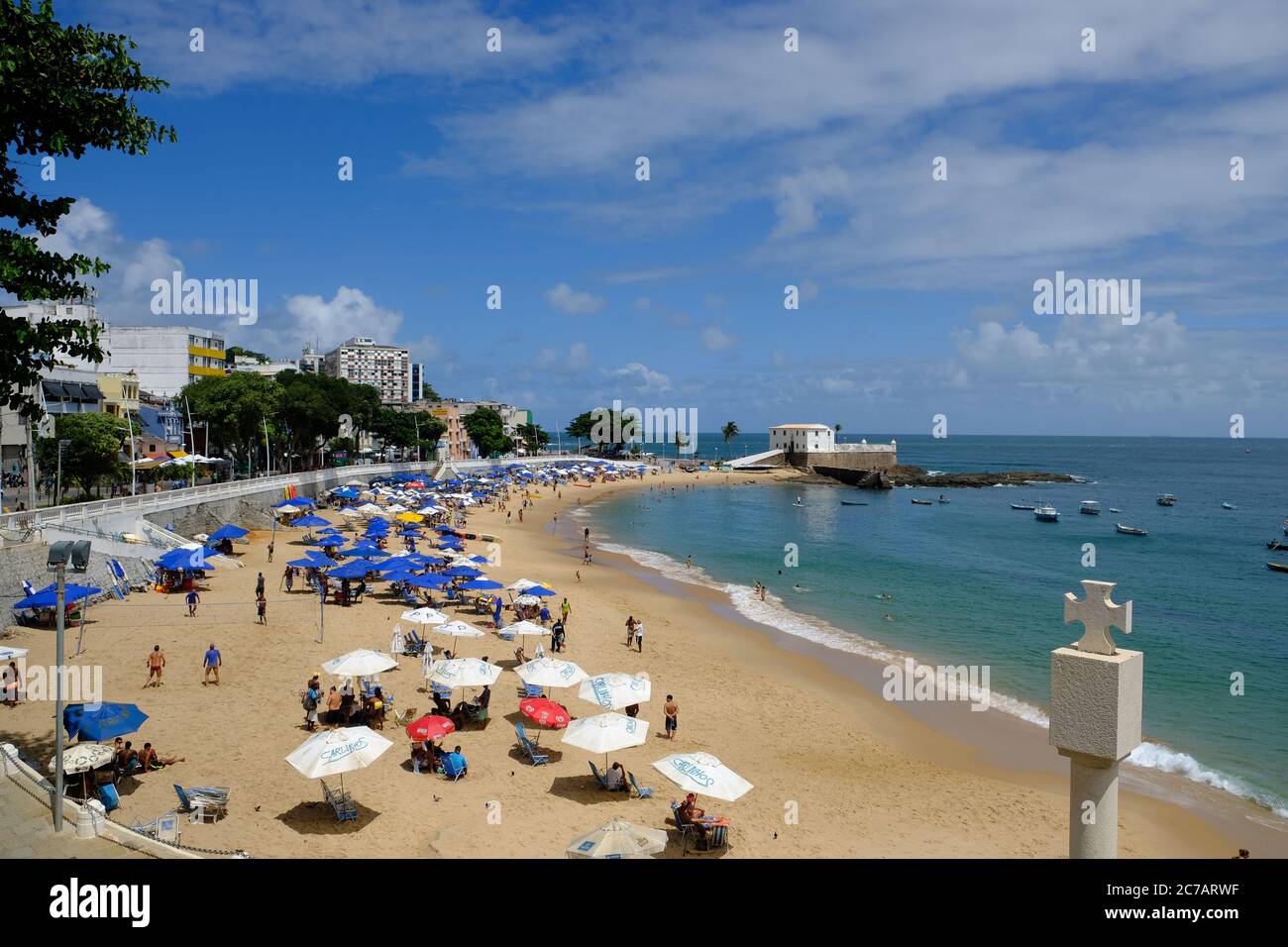 Salvador Bahia Brazil - Porto da Barra Beach with Christian cross Marco de Fundacao da Cidade Stock Photo
