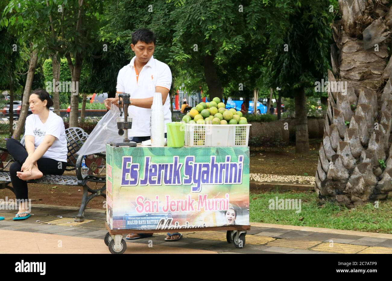 Semarang, Indonesia - December 24, 2018: Orange juice seller in Pancasila Field, Simpang Lima area, Central Java. Stock Photo