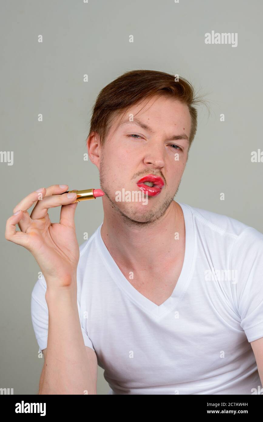 Man stubble lipstick hi-res stock photography and images - Alamy