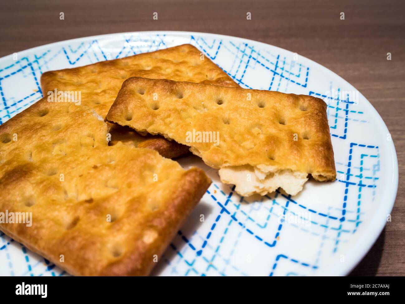 Broken Biscuits in the plate Stock Photo Alamy