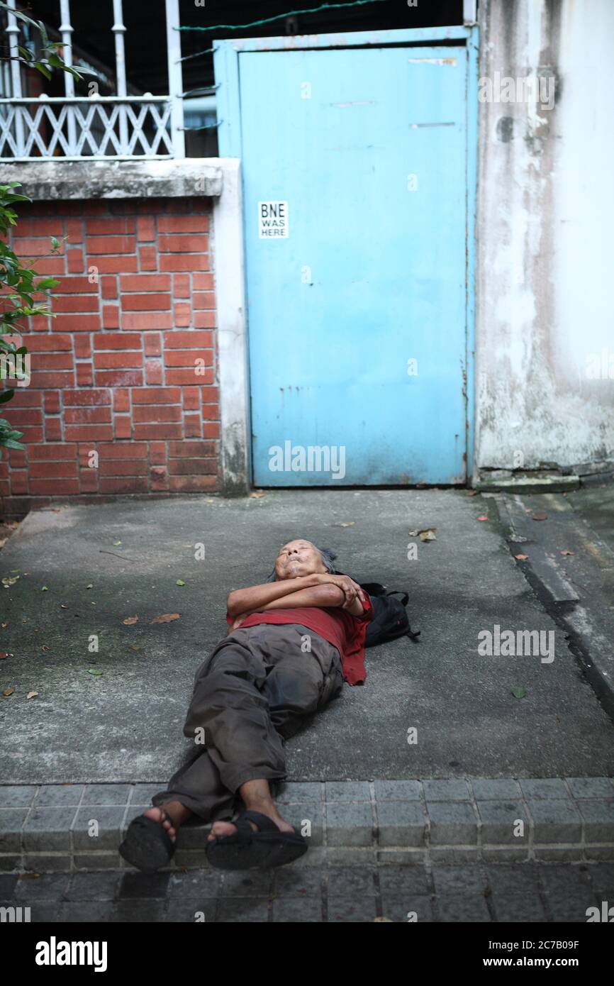 Singapore branded as first world country still have homeless person sleeping on the street. Stock Photo