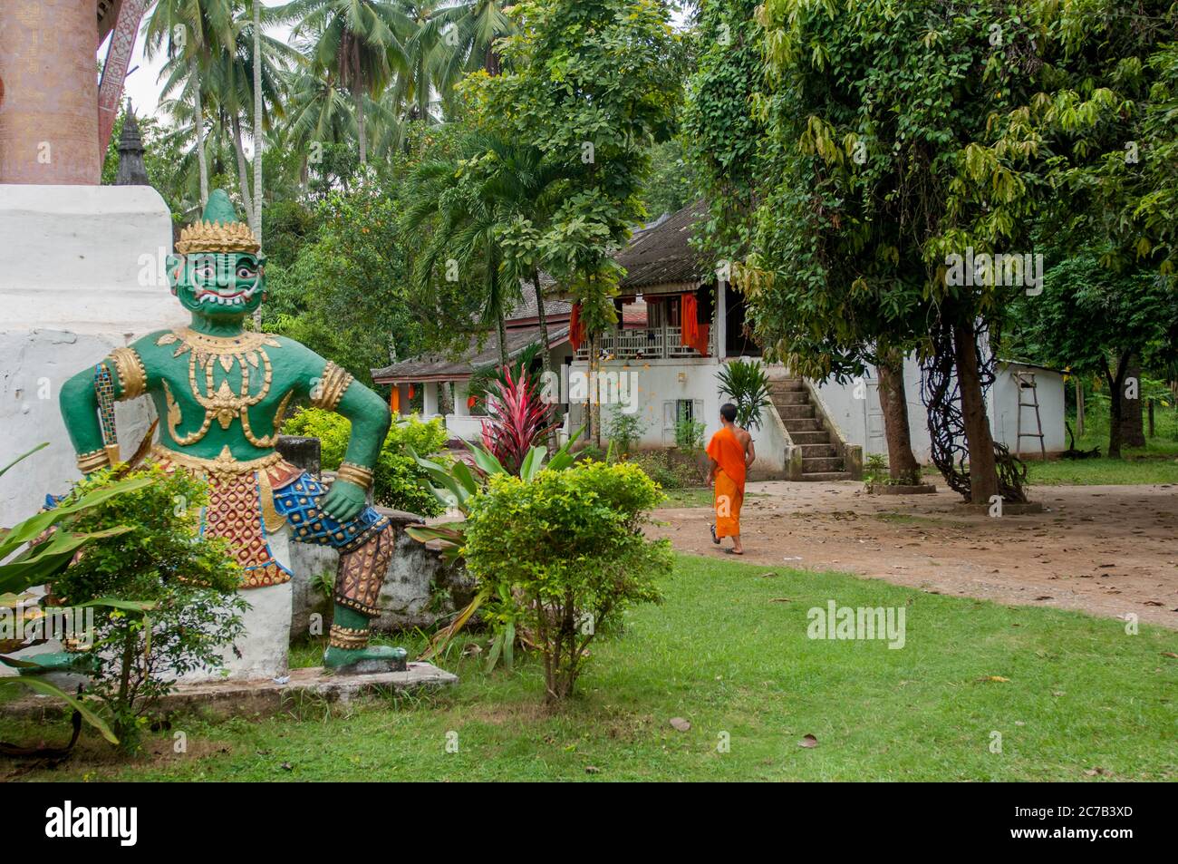 A guardian statue at Wat Aham, which served as the Residence of the Sangkhalat, the Supreme Patriarch of Buddhism, in Luang Prabang, central Laos. Stock Photo