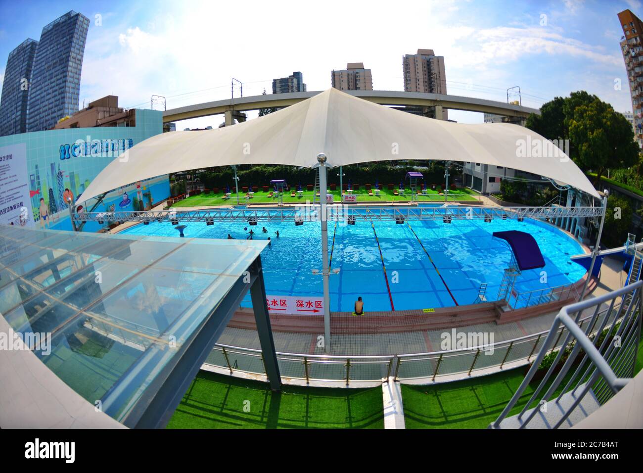 July 16, 2020, Shanghai, Shanghai, China: ShanghaiÃ¯Â¼Å'CHINA-Hongkou Swimming Pool, the oldest swimming pool in Shanghai, reopened on July 13 after a series of renovations. Hongkou swimming pool was founded in 1922, the eastern jiangwan road 500, east of one hundred, lu xun park, south reliance modern hongkou football stadium, has a history of 98 years, is the earliest open in Shanghai public swimming pool, after nearly hundred years vicissitudes of life change, as the public fitness, leisure, entertainment, summer activities, known to all, in order to make the famous old stadium continue to Stock Photo