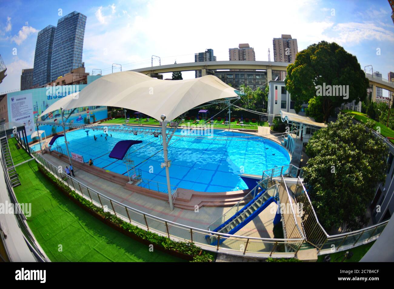 July 16, 2020, Shanghai, Shanghai, China: ShanghaiÃ¯Â¼Å'CHINA-Hongkou Swimming Pool, the oldest swimming pool in Shanghai, reopened on July 13 after a series of renovations. Hongkou swimming pool was founded in 1922, the eastern jiangwan road 500, east of one hundred, lu xun park, south reliance modern hongkou football stadium, has a history of 98 years, is the earliest open in Shanghai public swimming pool, after nearly hundred years vicissitudes of life change, as the public fitness, leisure, entertainment, summer activities, known to all, in order to make the famous old stadium continue to Stock Photo