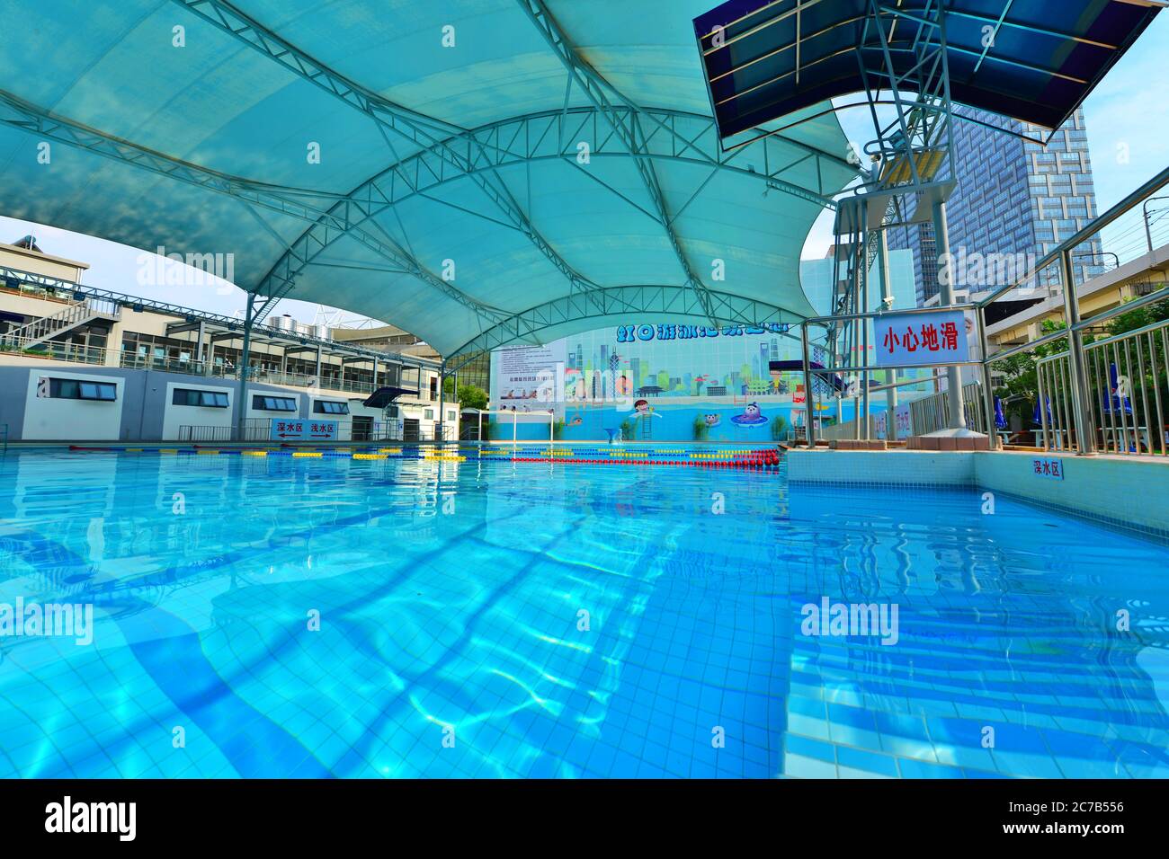 July 16, 2020, Shanghai, Shanghai, China: ShanghaiÃ¯Â¼Å'CHINA-Hongkou Swimming Pool, the oldest swimming pool in Shanghai, reopened on July 13 after a series of renovations. Hongkou swimming pool was founded in 1922, the eastern jiangwan road 500, east of one hundred, lu xun park, south reliance modern hongkou football stadium, has a history of 98 years, is the earliest open in Shanghai public swimming pool, after nearly hundred years vicissitudes of life change, as the public fitness, leisure, entertainment, summer activities, known to all, in order to make the famous old stadium continue to Stock Photo