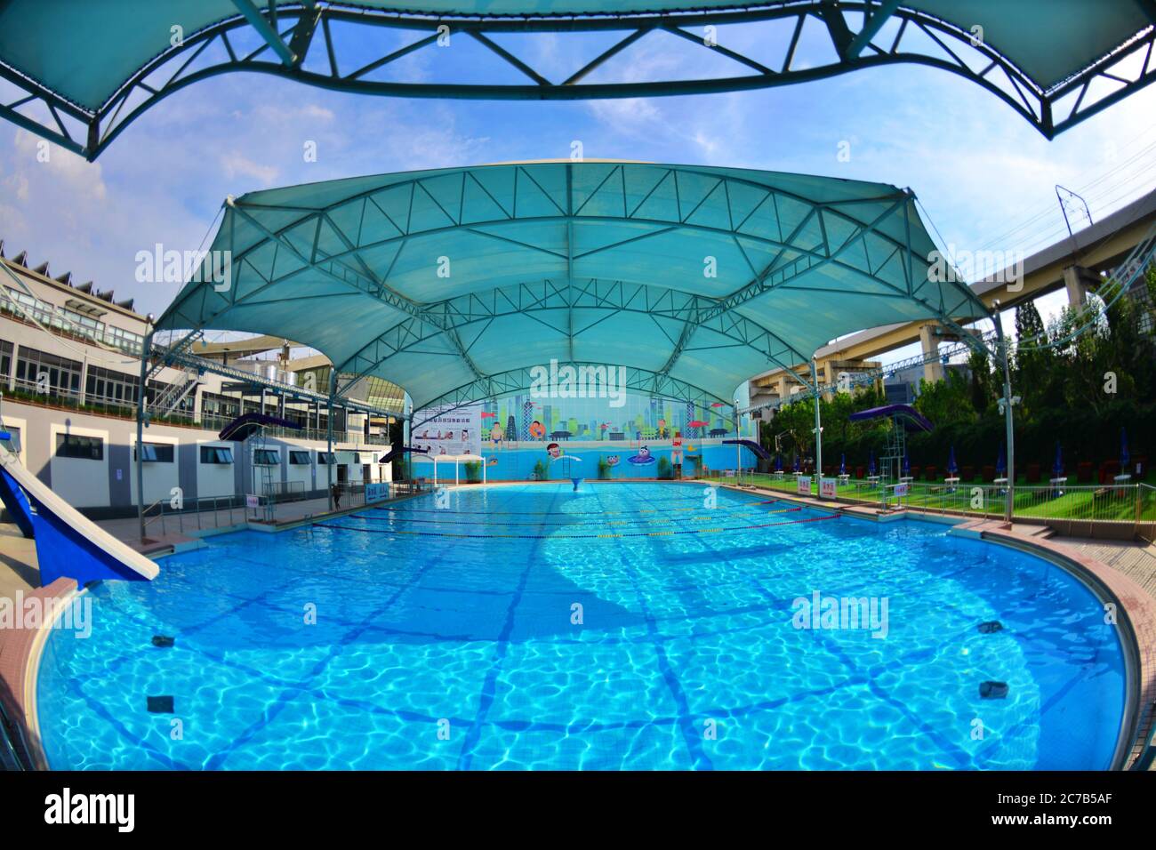 July 16, 2020, Shanghai, Shanghai, China: ShanghaiÃ¯Â¼Å'CHINA-Hongkou Swimming Pool, the oldest swimming pool in Shanghai, reopened on July 13 after a series of renovations. Hongkou swimming pool was founded in 1922, the eastern jiangwan road 500, east of one hundred, lu xun park, south reliance modern hongkou football stadium, has a history of 98 years, is the earliest open in Shanghai public swimming pool, after nearly hundred years vicissitudes of life change, as the public fitness, leisure, entertainment, summer activities, known to all, in order to make the famous old stadium continue to Stock Photo