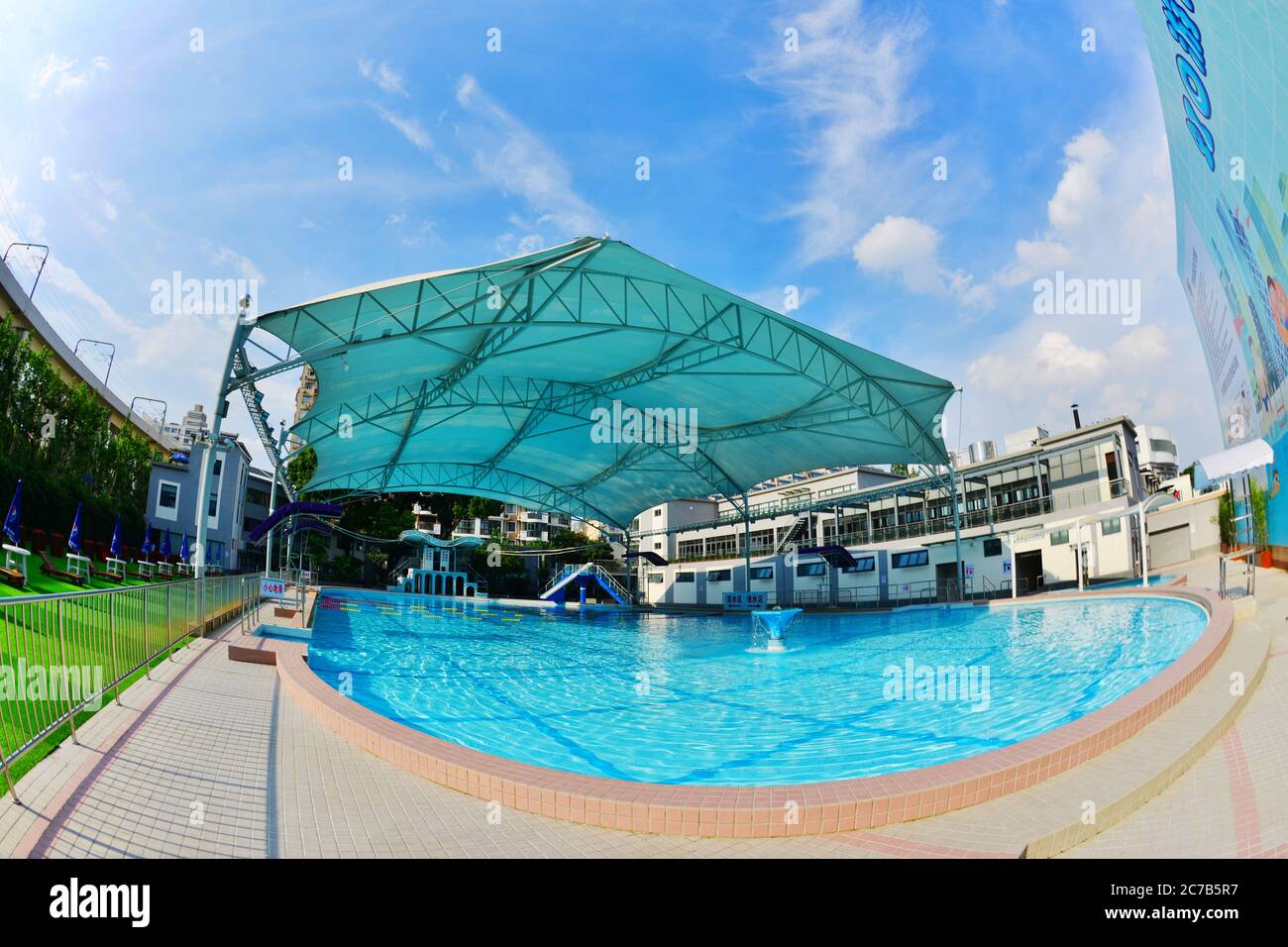 July 16, 2020, Shanghai, Shanghai, China: ShanghaiÃ¯Â¼Å'CHINA-Hongkou Swimming Pool, the oldest swimming pool in Shanghai, reopened on July 13 after a series of renovations. Hongkou swimming pool was founded in 1922, the eastern jiangwan road 500, east of one hundred, lu xun park, south reliance modern hongkou football stadium, has a history of 98 years, is the earliest open in Shanghai public swimming pool, after nearly hundred years vicissitudes of life change, as the public fitness, leisure, entertainment, summer activities, known to all, in order to make the famous old stadium continue to Stock Photo