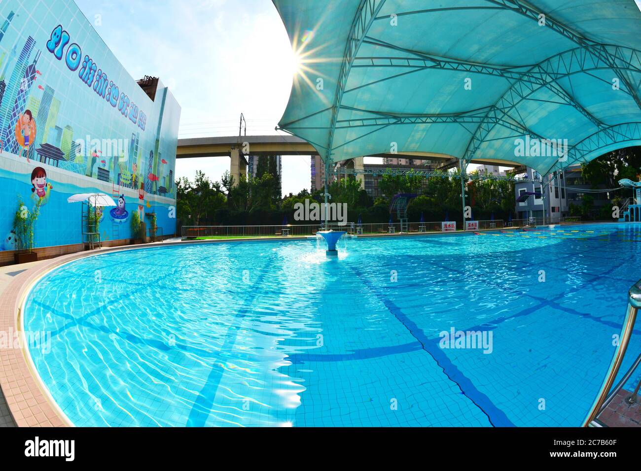 July 16, 2020, Shanghai, Shanghai, China: ShanghaiÃ¯Â¼Å'CHINA-Hongkou Swimming Pool, the oldest swimming pool in Shanghai, reopened on July 13 after a series of renovations. Hongkou swimming pool was founded in 1922, the eastern jiangwan road 500, east of one hundred, lu xun park, south reliance modern hongkou football stadium, has a history of 98 years, is the earliest open in Shanghai public swimming pool, after nearly hundred years vicissitudes of life change, as the public fitness, leisure, entertainment, summer activities, known to all, in order to make the famous old stadium continue to Stock Photo