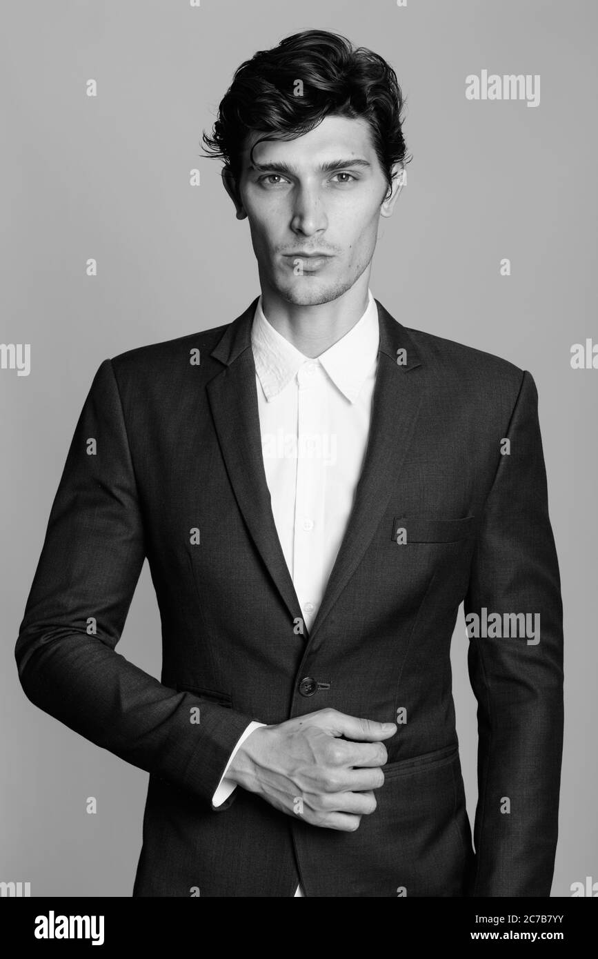 Portrait of young handsome man in black and white Stock Photo - Alamy