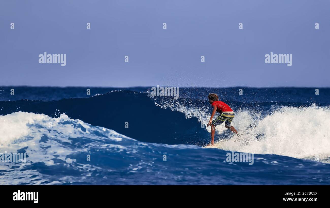 Professional surfer on the wave. Water sports activities. Atlantic Ocean Dominican Republic. 29.12.2016 Stock Photo
