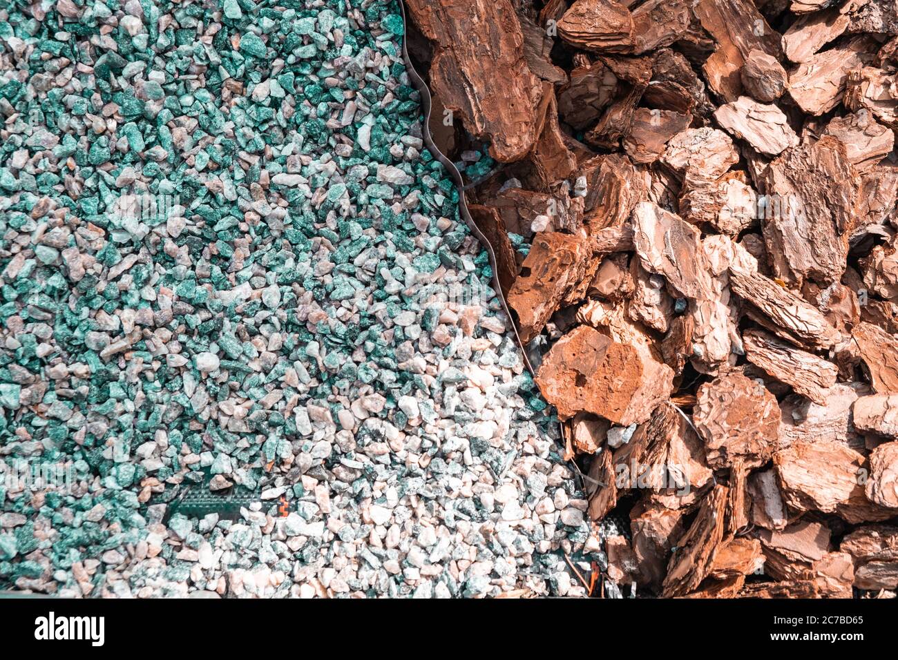 Sea pebbles and pine bark. landscape design background of pebbles and pine. Stock Photo