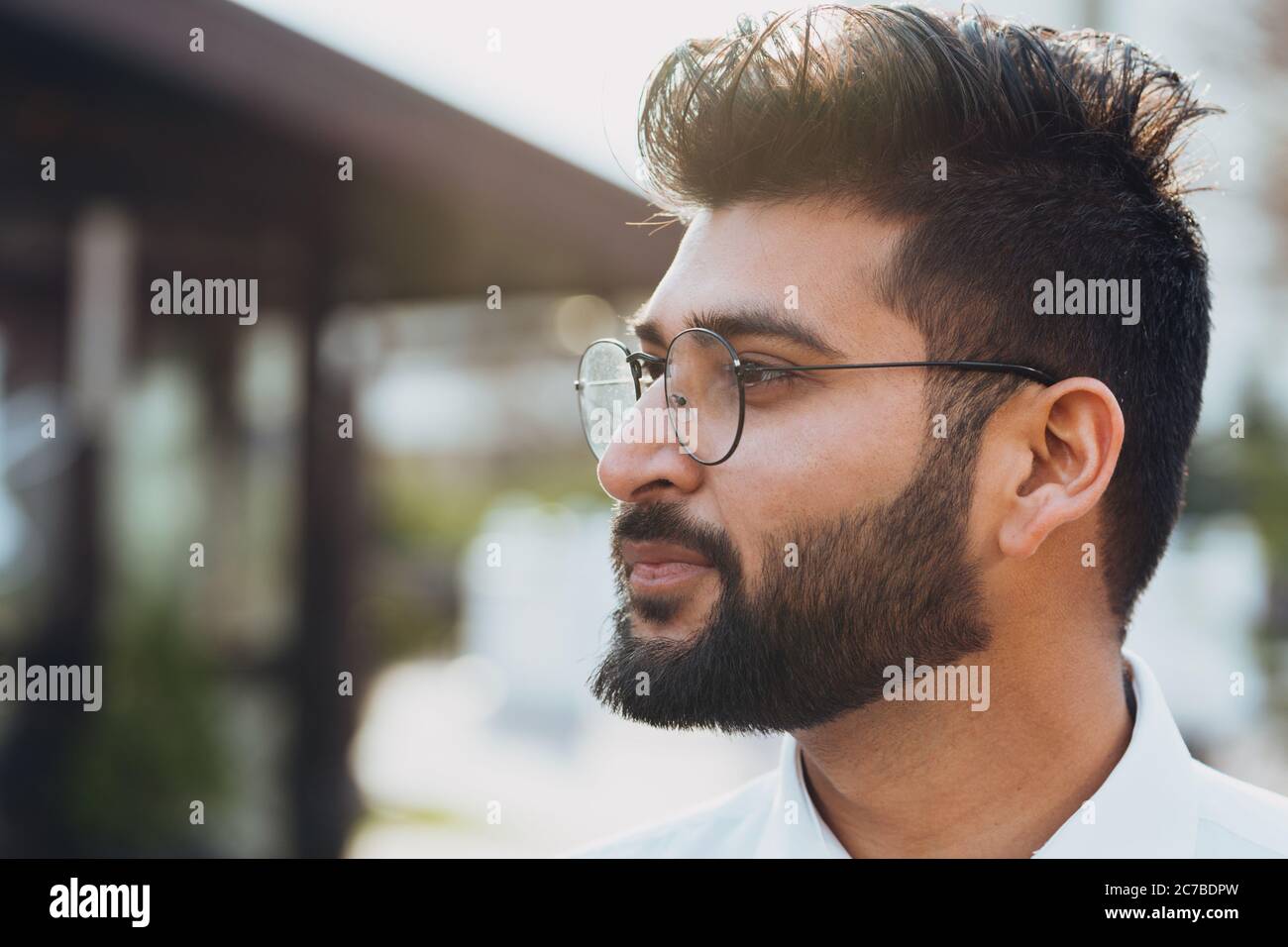Stylishly dressed Indian bearded man walks down the street Stock Photo -  Alamy