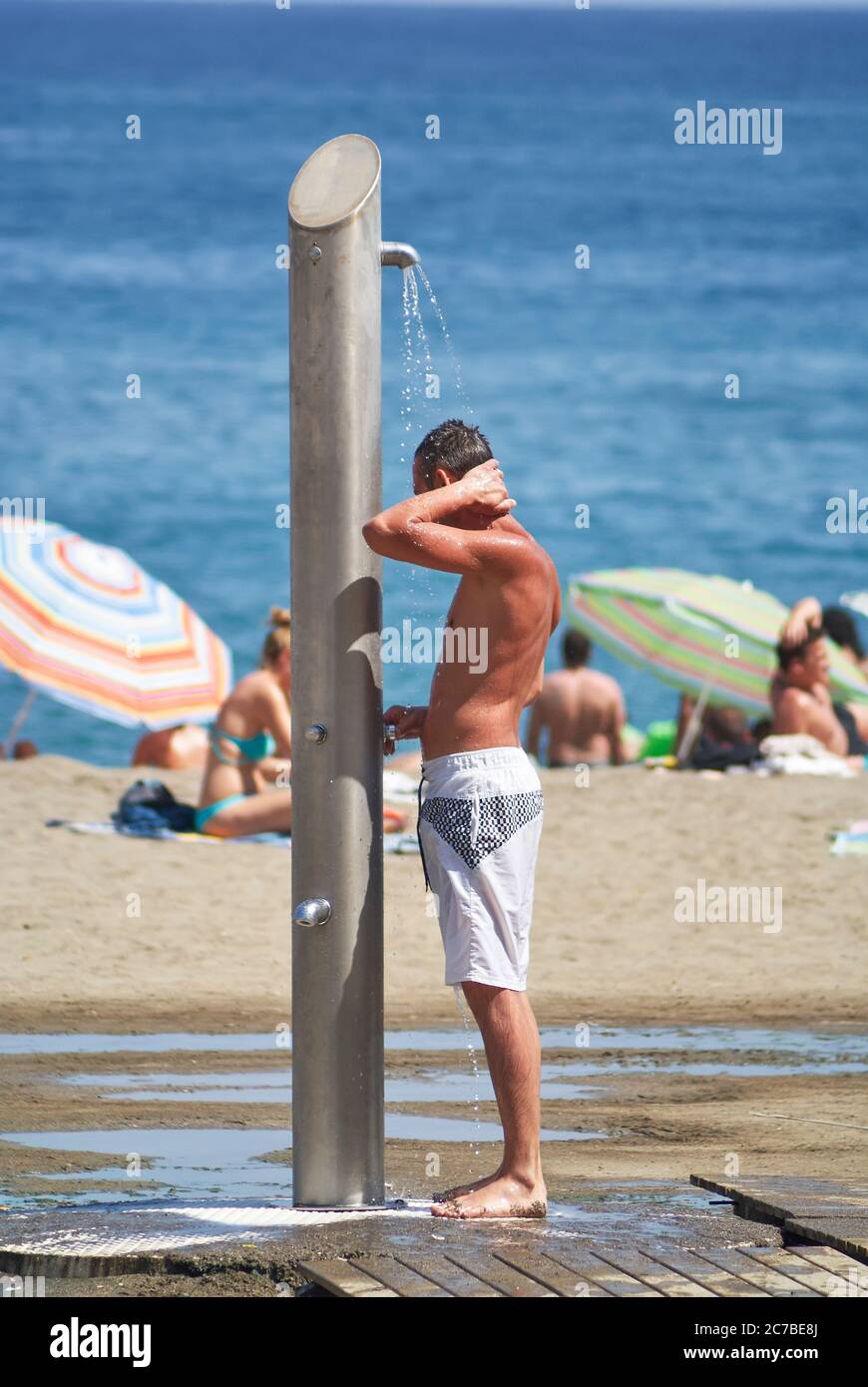 Man Shower And Beach