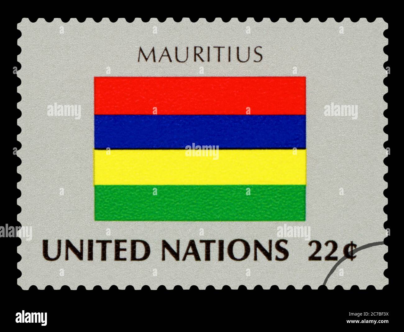 MAURITIUS - Postage Stamp of Mauritius national flag, Series of United Nations, circa 1984. Isolated on black background. Stock Photo