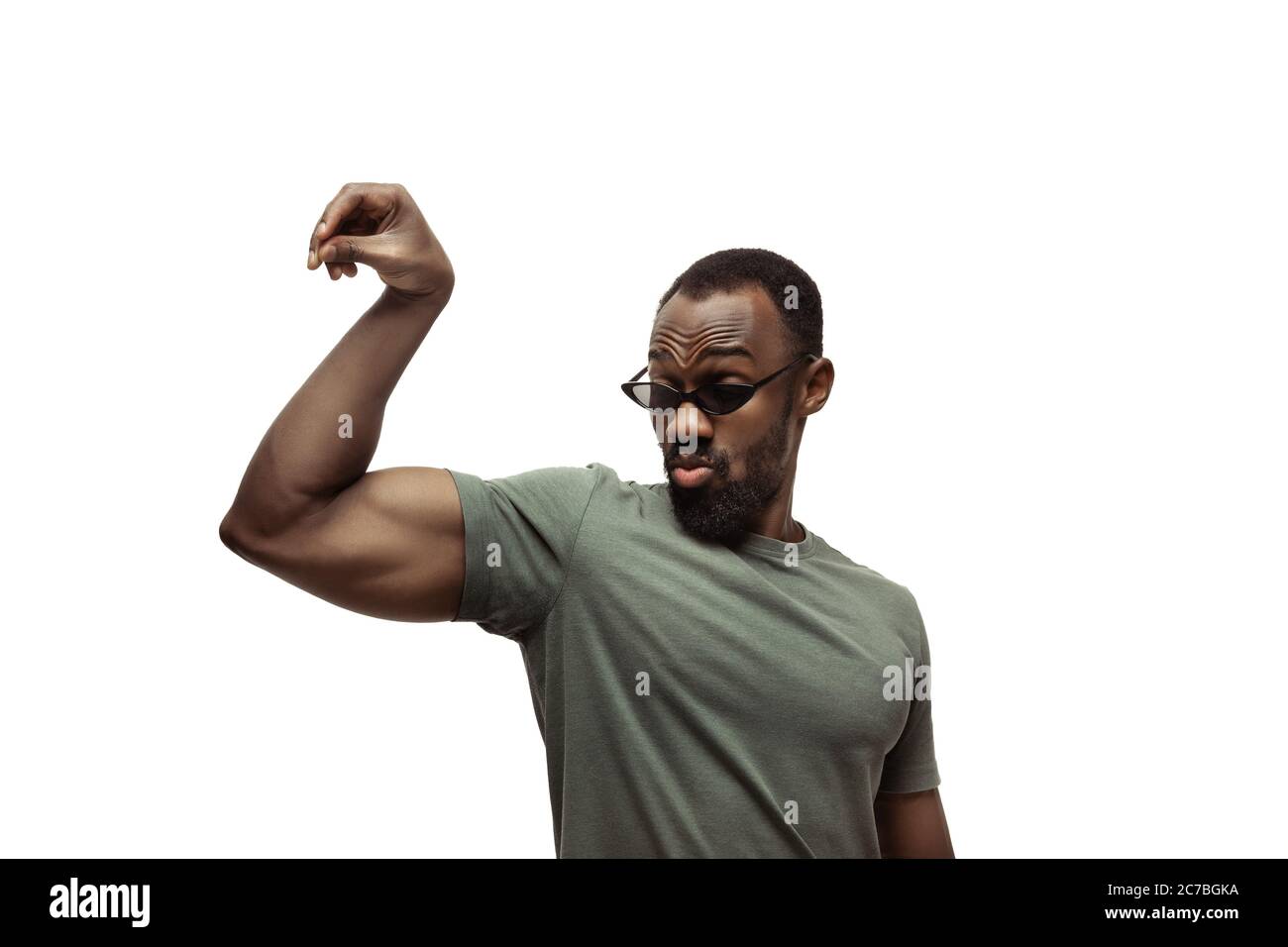 Salt bae. Young african-american man with funny, unusual popular emotions  and gestures on white studio background. Human emotions, facial expression,  sales, ad concept. Trendy look inspired by memes Stock Photo - Alamy