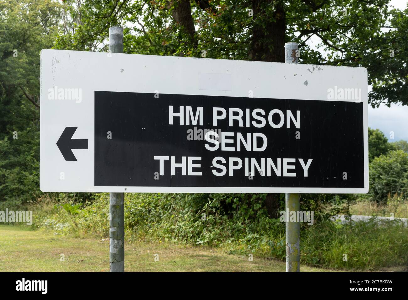 Sign at the entrance to HM Prison Send in Surrey, UK, a women's prison Stock Photo