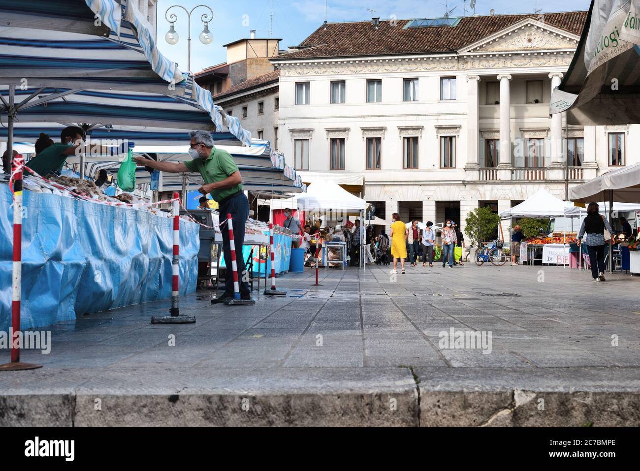 Italian open air market at covid-19 prevention time. Udine, Friuli Venezia Giulia, Italy Stock Photo