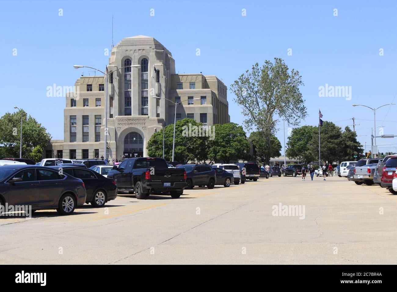 Full parking lot with cars from the Floyd Protest in Hutchinson