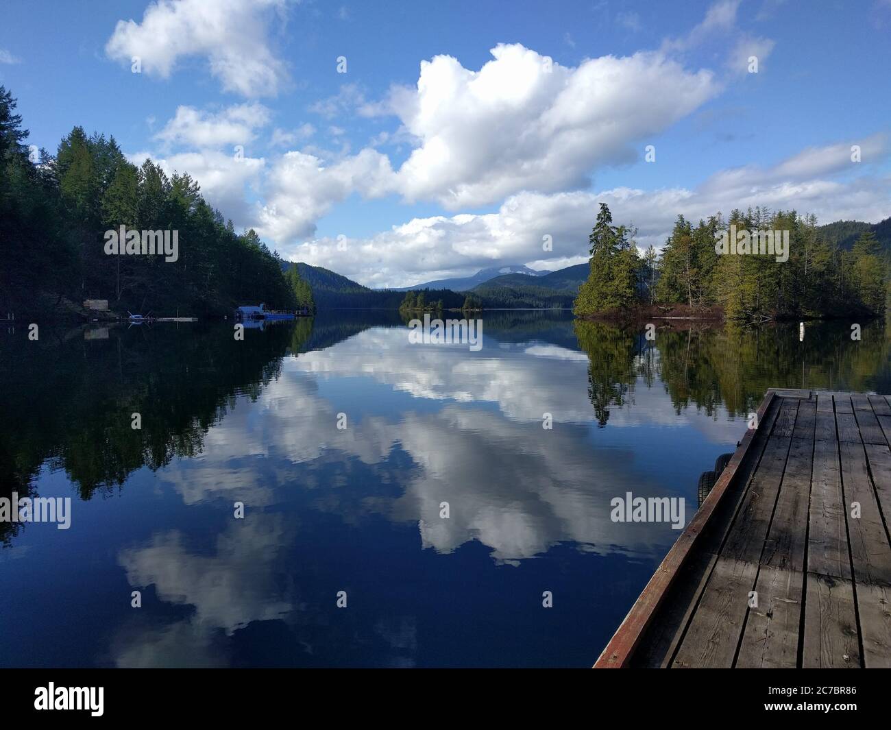 Landscape shot of a lake in Skookumchuck Narrows, Canada with the sky reflected in the clear water Stock Photo