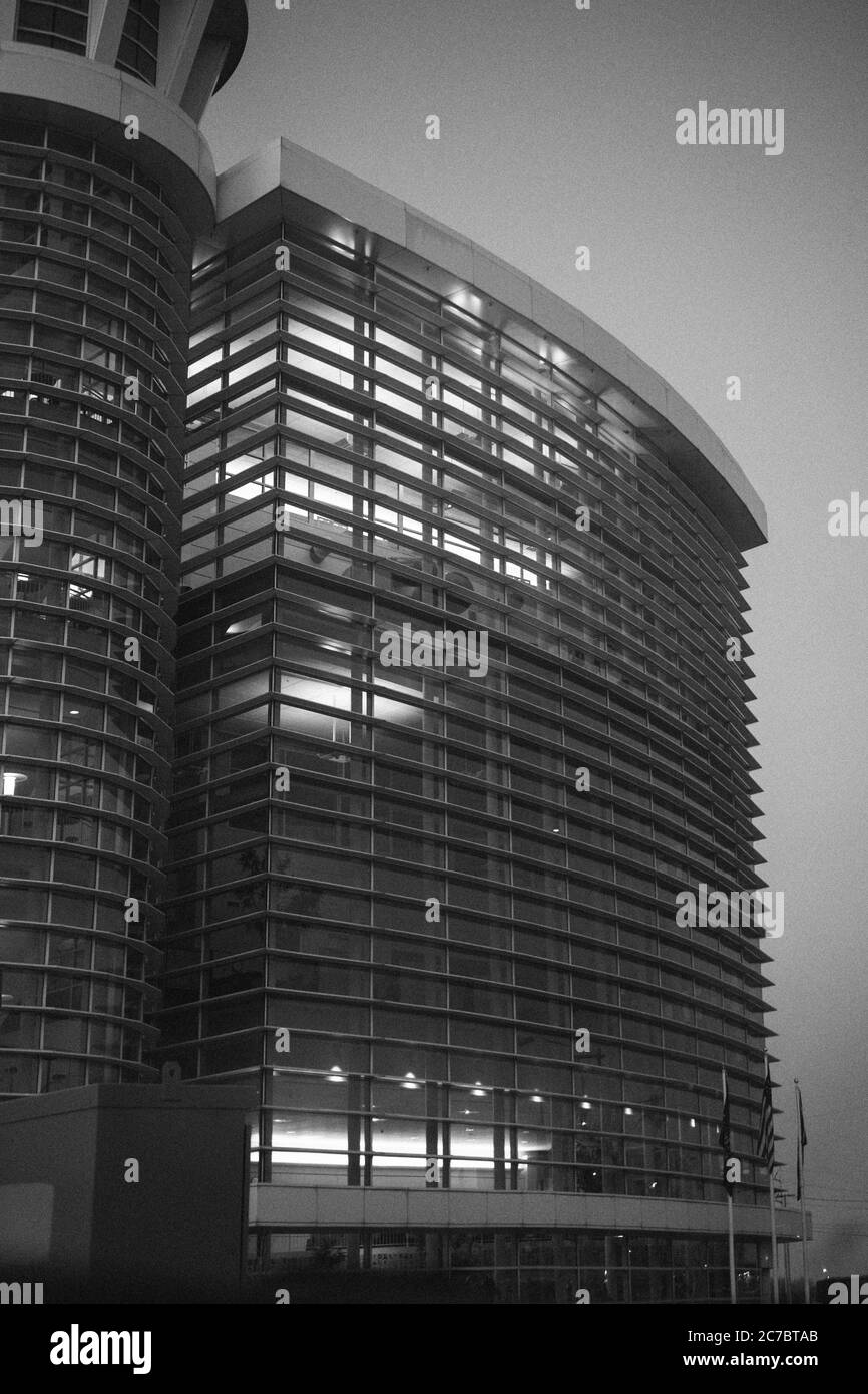 Vertical grayscale shot of a high rise architectural building Stock ...
