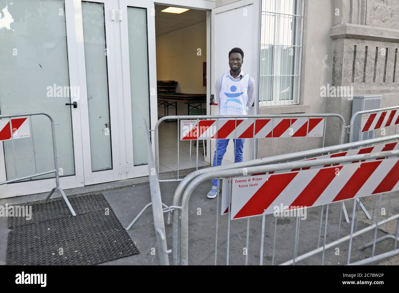 Milan (Italy), sorting center for refugees  and asylum seekers organized in  Sammartini street, under the Central Station,  and entrusted to management of the organization NGO Project Arca Stock Photo