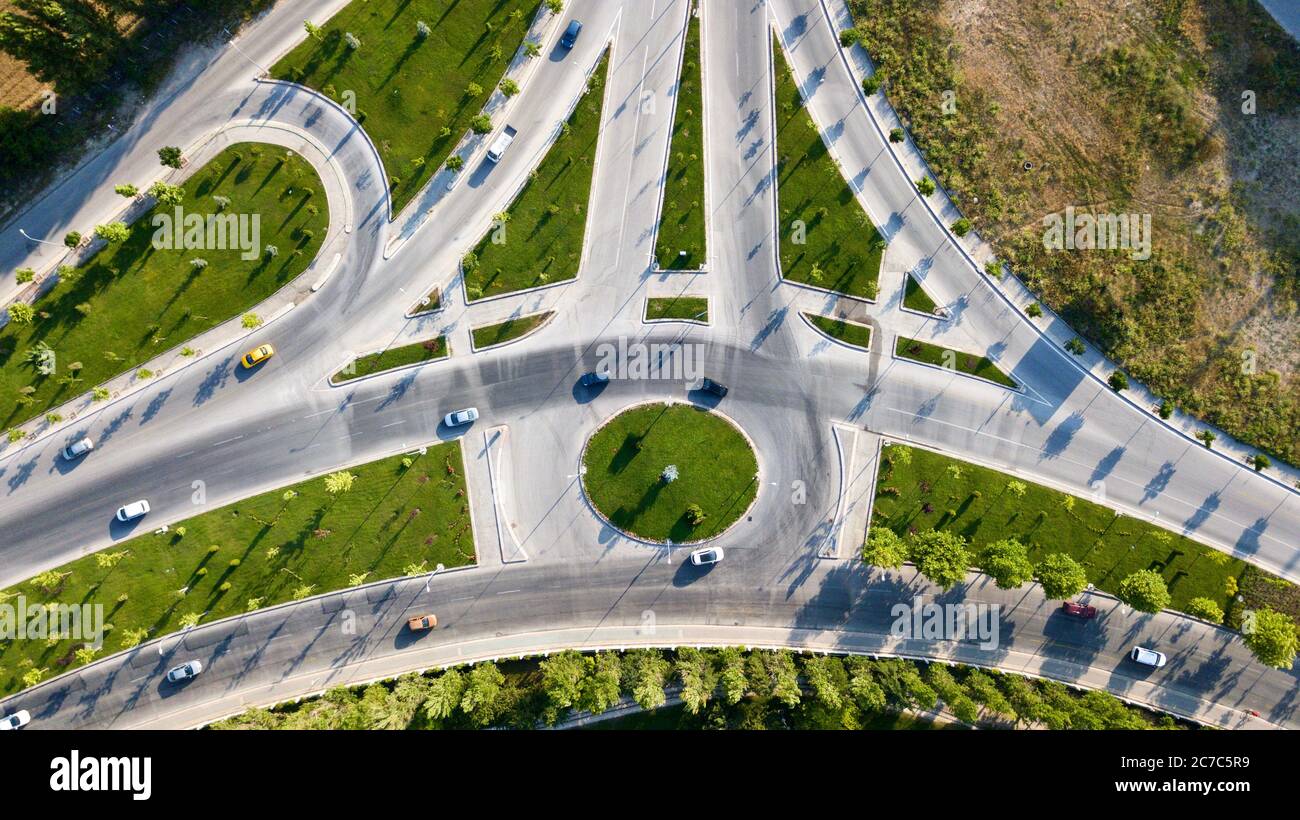 Aerial view of roundabout road. The transportation, traffic and byroad can be seen. Stock Photo