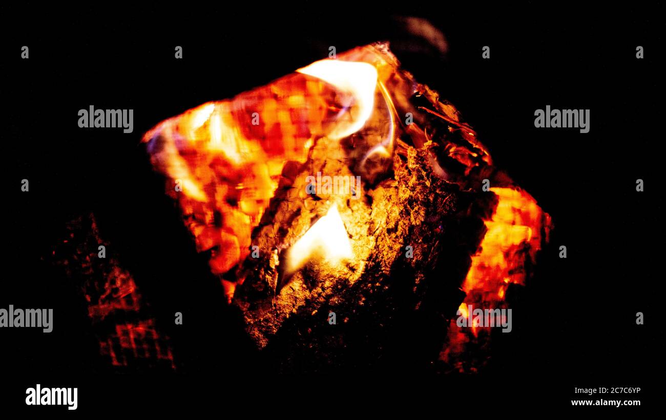 Closeup bright shot of dry wood burning  in a fireplace Stock Photo