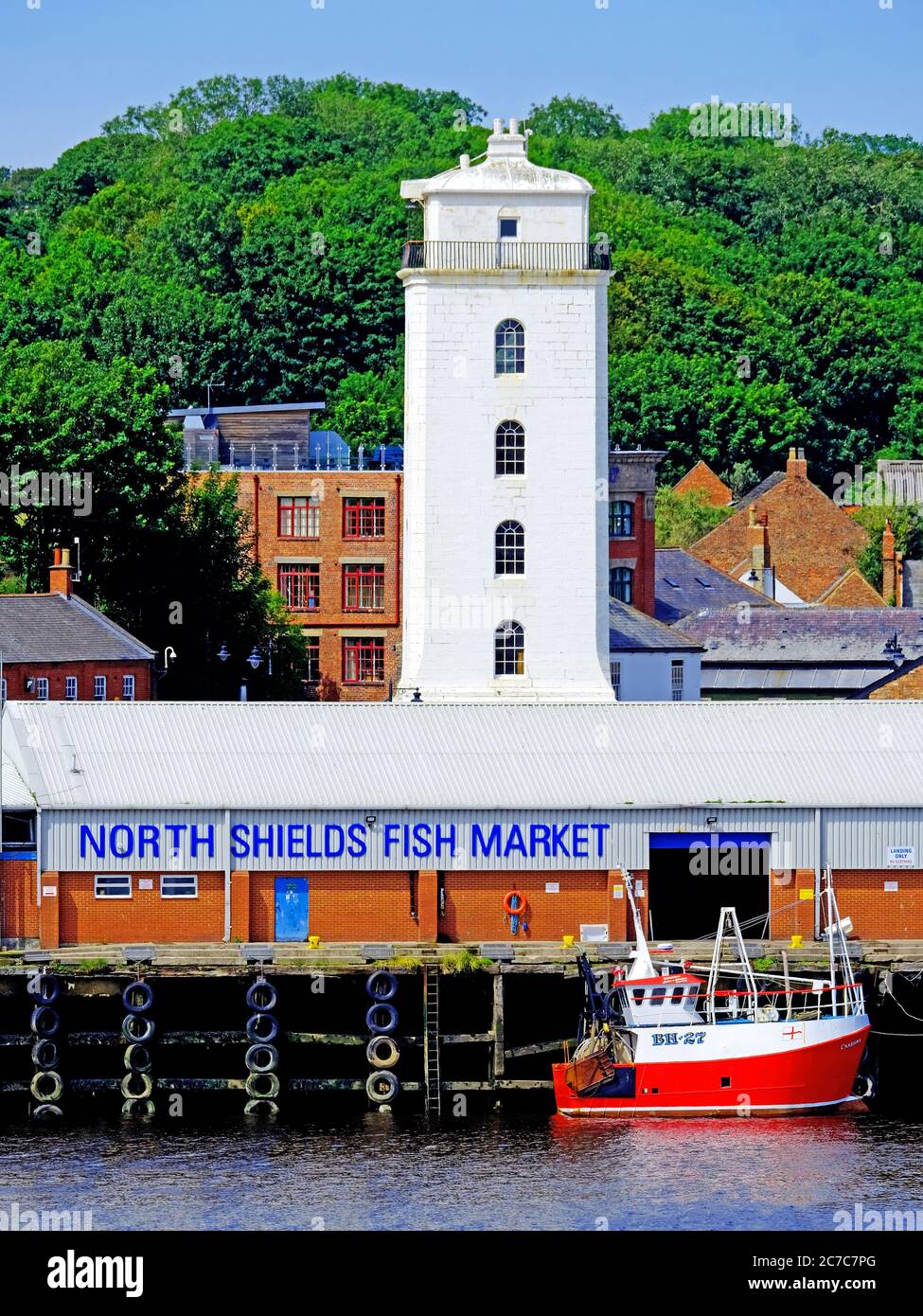North Shields Fish Market and fishing boat tied up alongside Stock Photo