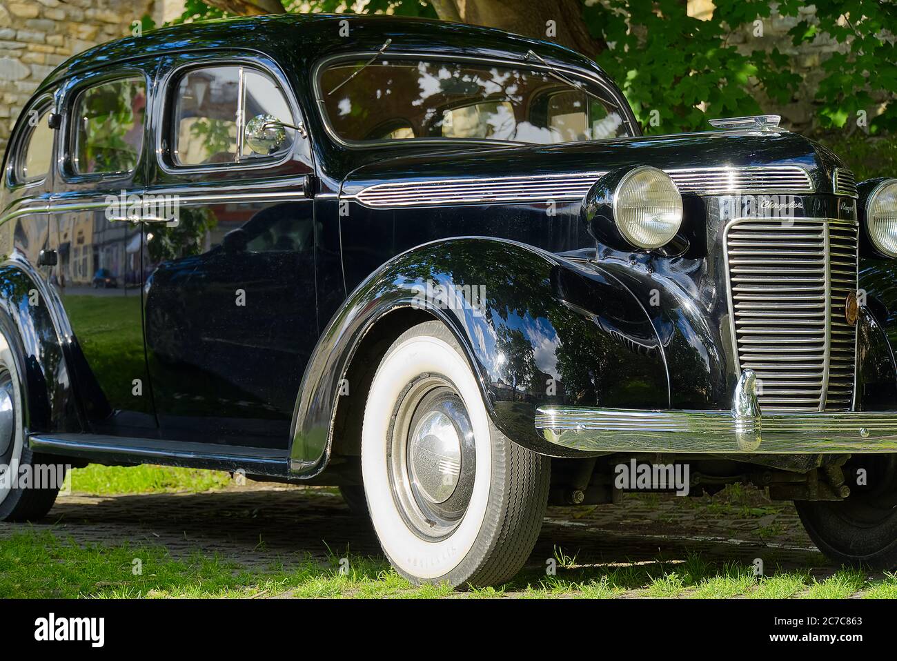 Haapsalu, Estonia - 12.07.2020 : Retro cars In Haapsalu. Closeup of black retro car Chrysler Royal. Stock Photo
