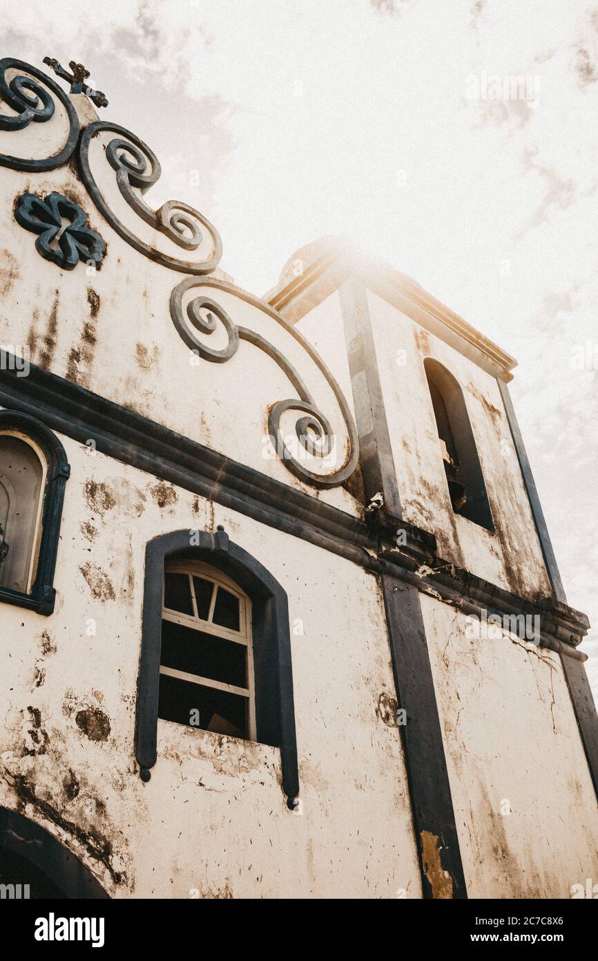 Vertical low angle shot of an old white building during daytime Stock ...