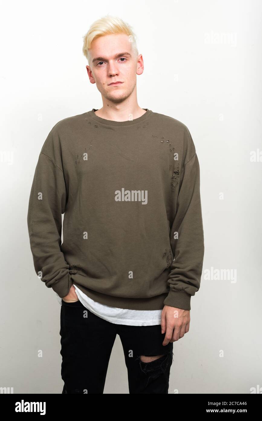 Portrait of young man with blond hair Stock Photo - Alamy
