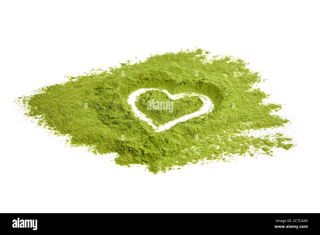 Freeze dried wheatgrass powder heart isolated on white background