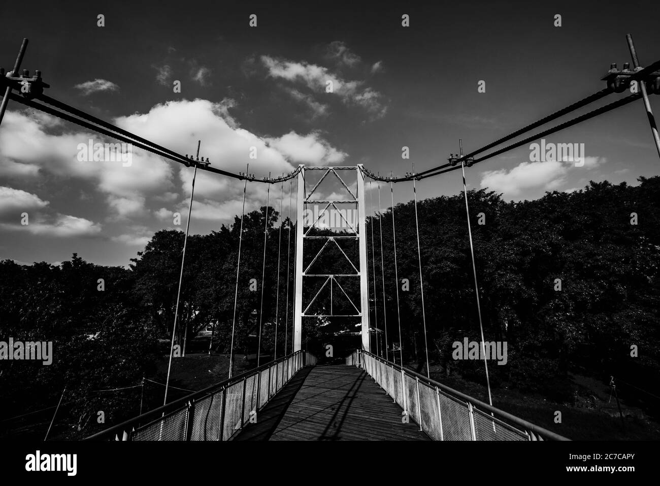 Wooden suspension bridge Black and White Stock Photos & Images - Alamy